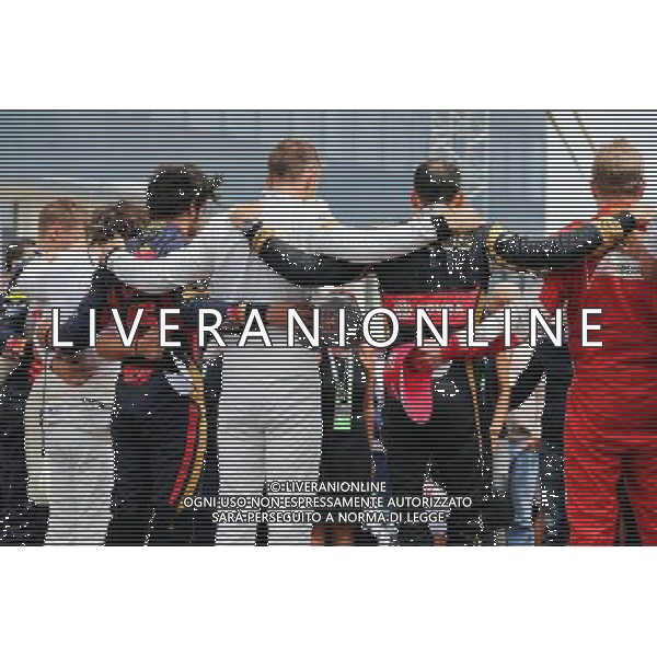 The drivers observe the tribute to Jules Bianchi on the grid. 26.07.2015. Formula 1 World Championship, Rd 10, Hungarian Grand Prix, Budapest, Hungary, Race Day. AG ALDO LIVERANI SAS ONLY ITALY