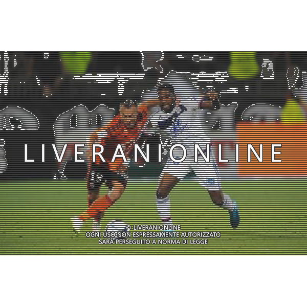 Romain PHILIPPOTEAUX / Arnold MVUEMBA - 09.08.2015 - Lyon / Lorient - 1er journee de Ligue 1 Photo : Jean Paul Thomas / Icon Sport AG ALDO LIVERANI SAS ONLY ITALY