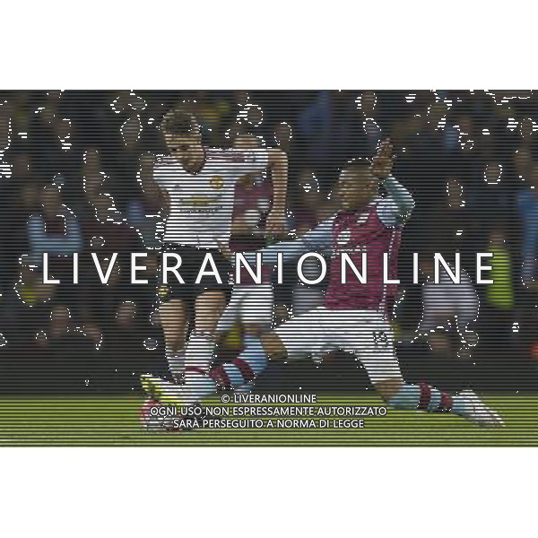 Aston Villa\'s Jordan Ayew makes a well timed challenge on Manchester United\'s Adnan Januzaj Photographer Craig Mercer/CameraSport Football - Barclays Premiership - Aston Villa v Manchester United - Friday 14th August 2015 - Villa Park - Birmingham © CameraSport - 43 Linden Ave. Countesthorpe. Leicester. England. LE8 5PG - Tel: +44 (0) 116 277 4147 - admin@camerasport.com - www.camerasport.com AG ALDO LIVERANI SAS ONLY ITALY