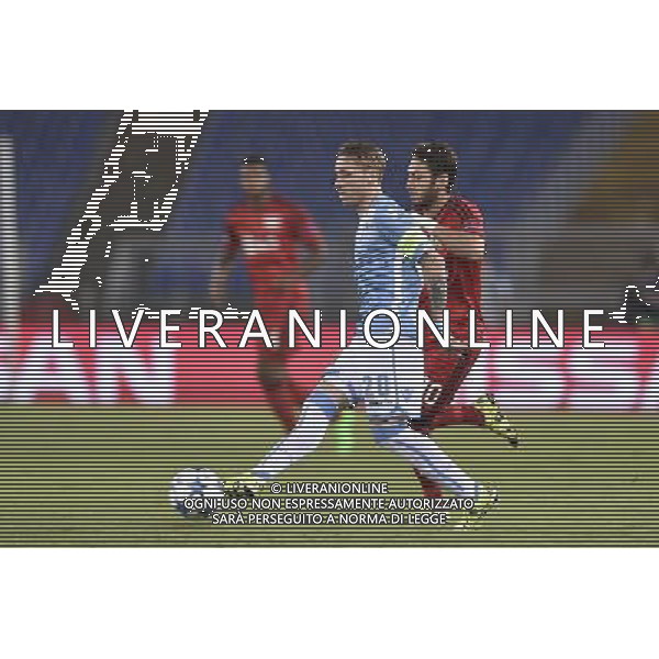 Roma - 18/08/2015 - Stadio Olimpico - UEFA Champions League 2015-2016 - Spareggi andata - Lazio vs Bayern Leverkusen - nella foto: Lucas Biglia e Hakan Calhanogiu / Ph. Fabrizio Corradetti - Ag. Aldo Liverani sas