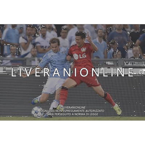 Roma - 18/08/2015 - Stadio Olimpico - UEFA Champions League 2015-2016 - Spareggi andata - Lazio vs Bayern Leverkusen - nella foto: Senad Lulic e Son Heng-Min / Ph. Fabrizio Corradetti - Ag. Aldo Liverani sas