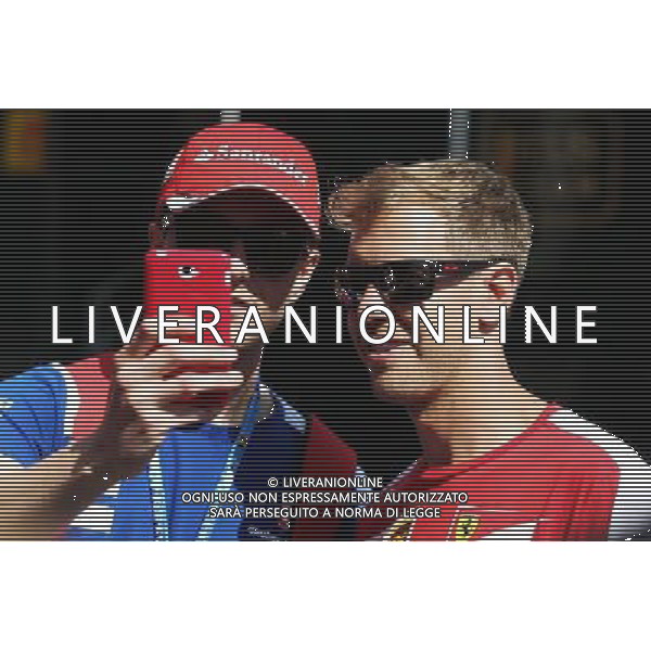 Sebastian Vettel (GER) Ferrari with a fan. 20.08.2015. Formula 1 World Championship, Rd 11, Belgian Grand Prix, Spa Francorchamps, Belgium, Preparation Day. /AGENZIA ALDO LIVERANI SAS - ITALY ONLY - EDITORIAL USE ONLY - Gp f1 Belgio