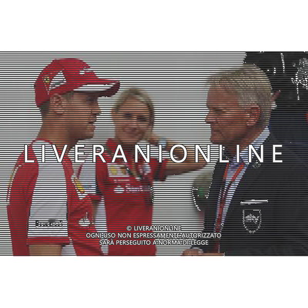 (L to R): Sebastian Vettel (GER) Ferrari with Mark Surer (SUI). 20.08.2015. Formula 1 World Championship, Rd 11, Belgian Grand Prix, Spa Francorchamps, Belgium, Preparation Day. AG ALDO LIVERANI SAS ONLY ITALY