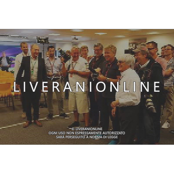 Bernie Ecclestone (GBR) joins the photographers. 21.08.2015. Formula 1 World Championship, Rd 11, Belgian Grand Prix, Spa Francorchamps, Belgium, Practice Day. AG ALDO LIVERANI SAS ONLY ITALY