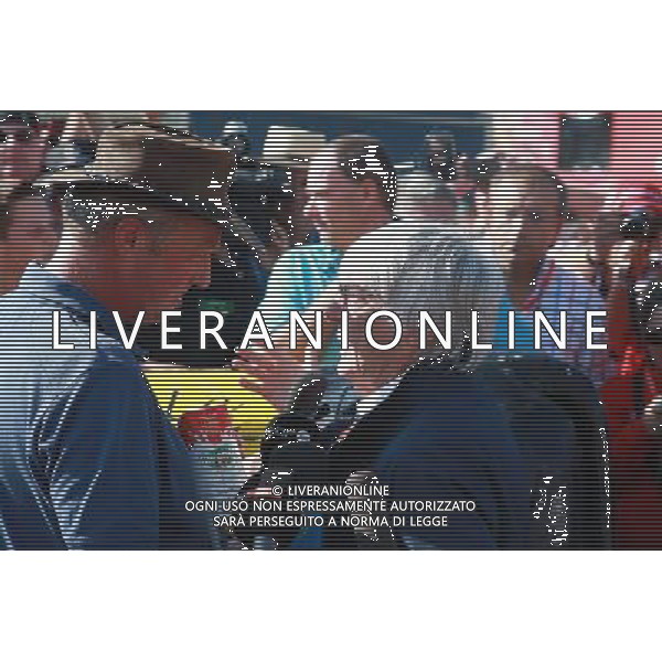 Bernie Ecclestone (GBR) meets Belgian farmers who protest with a cow in a campagin for a fair price for their milk. /AGENZIA ALDO LIVERANI SAS - ITALY ONLY - EDITORIAL USE ONLY - Gp F1 Belgio Prove Ufficiali