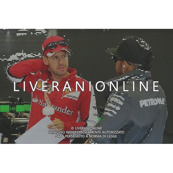(L to R): Sebastian Vettel (GER) Ferrari with Lewis Hamilton (GBR) Mercedes AMG F1. 23.08.2015. Formula 1 World Championship, Rd 13, Belgian Grand Prix, Spa Francorchamps, Belgium, Race Day. /AGENZIA ALDO LIVERANI SAS - ITALY ONLY - EDITORIAL USE ONLY - Gp F1 Belgio Gara