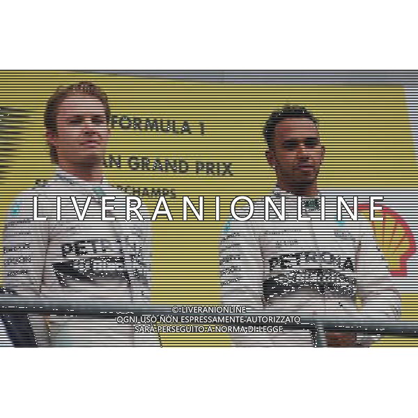 (L to R): Nico Rosberg (GER) Mercedes AMG F1 with race winner Lewis Hamilton (GBR) Mercedes AMG F1 on the podium. 23.08.2015. Formula 1 World Championship, Rd 13, Belgian Grand Prix, Spa Francorchamps, Belgium, Race Day. /AGENZIA ALDO LIVERANI SAS - ITALY ONLY - EDITORIAL USE ONLY - Gp F1 Belgio Gara
