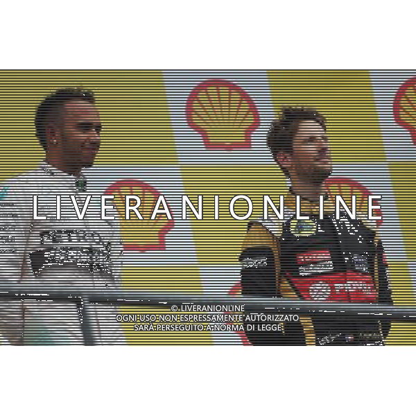 The podium (L to R): Race winner Lewis Hamilton (GBR) Mercedes AMG F1 with Romain Grosjean (FRA) Lotus F1 Team on the podium. 23.08.2015. Formula 1 World Championship, Rd 13, Belgian Grand Prix, Spa Francorchamps, Belgium, Race Day. /AGENZIA ALDO LIVERANI SAS - ITALY ONLY - EDITORIAL USE ONLY - Gp F1 Belgio Gara