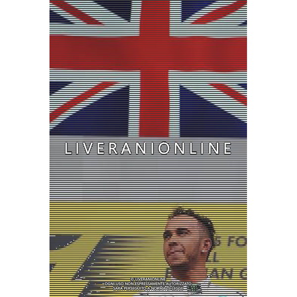 Race winner Lewis Hamilton (GBR) Mercedes AMG F1 celebrates on the podium. 23.08.2015. Formula 1 World Championship, Rd 13, Belgian Grand Prix, Spa Francorchamps, Belgium, Race Day. /AGENZIA ALDO LIVERANI SAS - ITALY ONLY - EDITORIAL USE ONLY - Gp F1 Belgio Gara