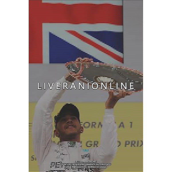 Race winner Lewis Hamilton (GBR) Mercedes AMG F1 celebrates on the podium. 23.08.2015. Formula 1 World Championship, Rd 13, Belgian Grand Prix, Spa Francorchamps, Belgium, Race Day. /AGENZIA ALDO LIVERANI SAS - ITALY ONLY - EDITORIAL USE ONLY - Gp F1 Belgio Gara