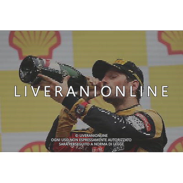 Romain Grosjean (FRA) Lotus F1 Team celebrates his third position on the podium. 23.08.2015. Formula 1 World Championship, Rd 13, Belgian Grand Prix, Spa Francorchamps, Belgium, Race Day. /AGENZIA ALDO LIVERANI SAS - ITALY ONLY - EDITORIAL USE ONLY - Gp F1 Belgio Gara