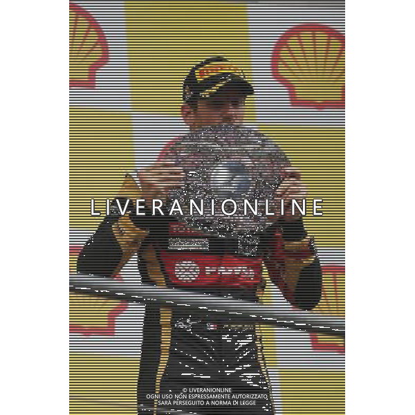 Romain Grosjean (FRA) Lotus F1 Team celebrates his third position on the podium. 23.08.2015. Formula 1 World Championship, Rd 13, Belgian Grand Prix, Spa Francorchamps, Belgium, Race Day. /AGENZIA ALDO LIVERANI SAS - ITALY ONLY - EDITORIAL USE ONLY - Gp F1 Belgio Gara