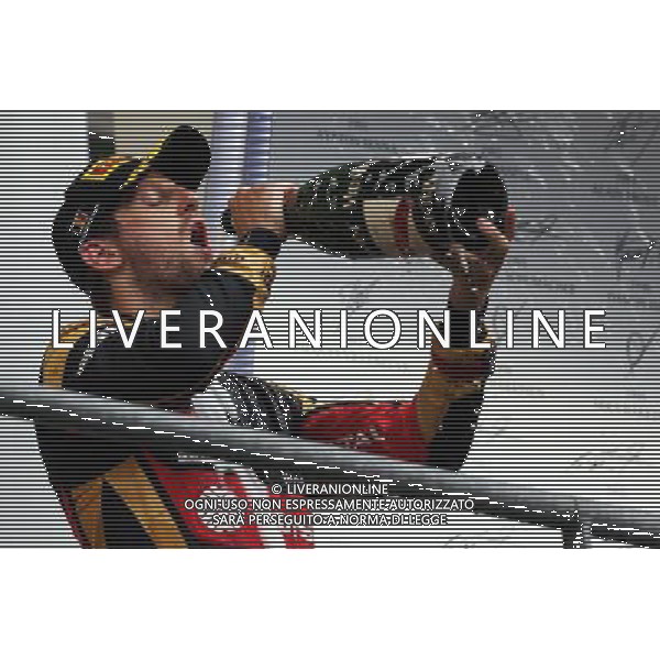 Romain Grosjean (FRA) Lotus F1 Team celebrates his third position on the podium. 23.08.2015. Formula 1 World Championship, Rd 13, Belgian Grand Prix, Spa Francorchamps, Belgium, Race Day. /AGENZIA ALDO LIVERANI SAS - ITALY ONLY - EDITORIAL USE ONLY - Gp F1 Belgio Gara