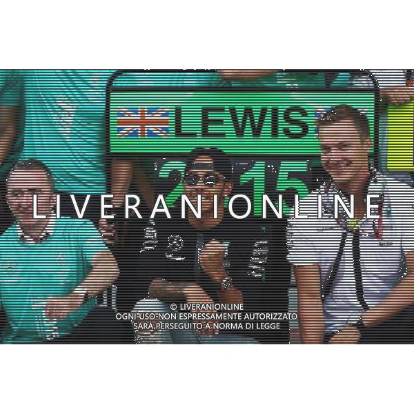 Race winner Lewis Hamilton (GBR) Mercedes AMG F1 celebrates with the team. 23.08.2015. Formula 1 World Championship, Rd 13, Belgian Grand Prix, Spa Francorchamps, Belgium, Race Day. AG ALDO LIVERANI SAS ONLY ITALY