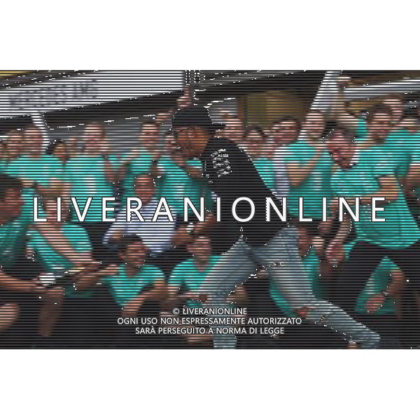 Race winner Lewis Hamilton (GBR) Mercedes AMG F1 celebrates with the team. 23.08.2015. Formula 1 World Championship, Rd 13, Belgian Grand Prix, Spa Francorchamps, Belgium, Race Day. AG ALDO LIVERANI SAS ONLY ITALY