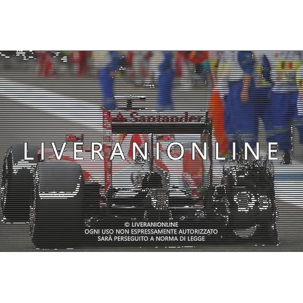 Sebastian Vettel (GER) Ferrari with his punctured Pirelli tyre. 23.08.2015. Formula 1 World Championship, Rd 13, Belgian Grand Prix, Spa Francorchamps, Belgium, Race Day. AG ALDO LIVERANI SAS ONLY ITALY