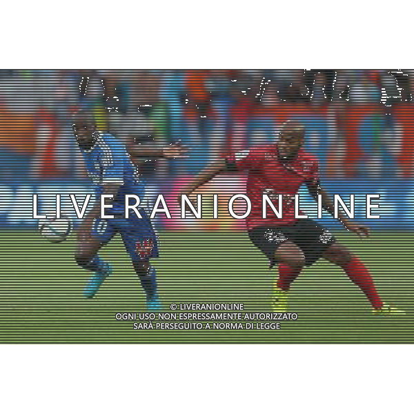 Lassana DIARRA / Jimmy BRIAND - 28.08.2015 - Guingamp / Marseille - 4eme journee de Ligue 1 Photo : Vincent Michel / Icon Sport /AGENZIA ALDO LIVERANI Sas - ITALY ONLY - EDITORIAL USE ONLY
