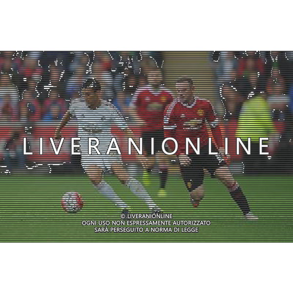 Swansea City\'s Jack Cork under pressure from Manchester United\'s Wayne Rooney Photographer Kevin Barnes/CameraSport Football - Barclays Premiership - Swansea City v Manchester United - Sunday 30th August 2015 - Liberty Stadium - Swansea © CameraSport - 43 Linden Ave. Countesthorpe. Leicester. England. LE8 5PG - Tel: +44 (0) 116 277 4147 - admin@camerasport.com - www.camerasport.com AG ALDO LIVERANI SAS ONLY ITALY