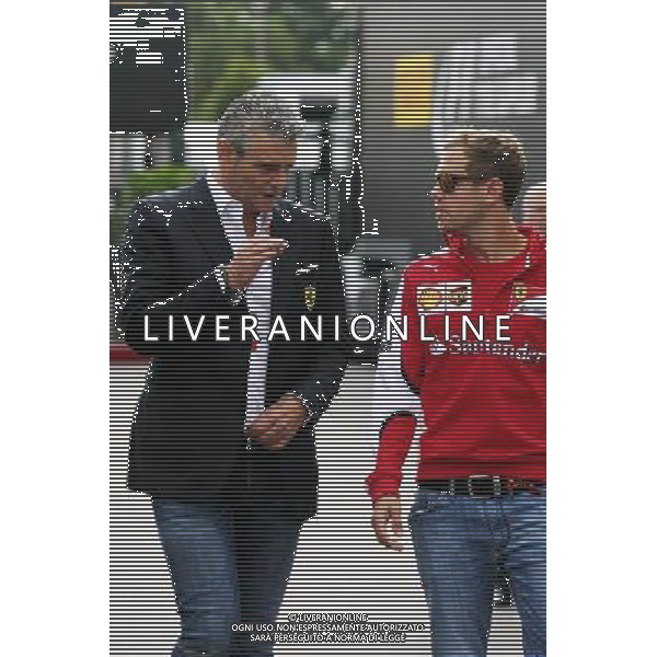 (L to R): Maurizio Arrivabene (ITA) Ferrari Team Principal with Sebastian Vettel (GER) Ferrari. 03.09.2015. Formula 1 World Championship, Rd 12, Italian Grand Prix, Monza, Italy, Preparation Day. AG ALDO LIVERANI SAS ONLY ITALY
