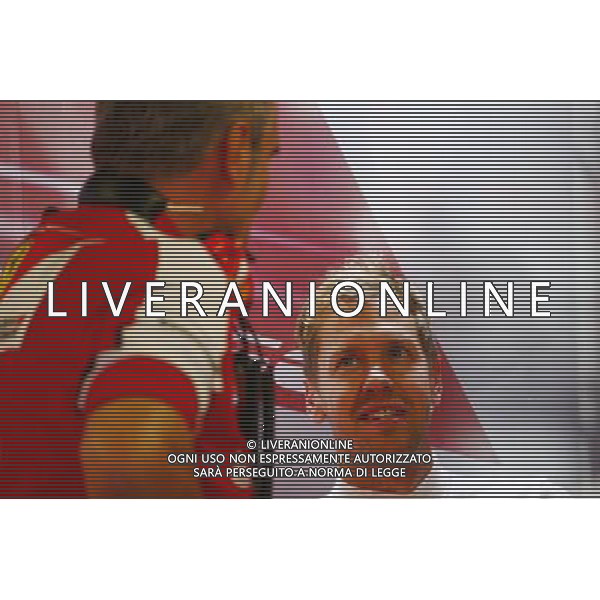 Sebastian Vettel (GER) Ferrari with Maurizio Arrivabene (ITA) Ferrari Team Principal. 04.09.2015. Formula 1 World Championship, Rd 12, Italian Grand Prix, Monza, Italy, Practice Day. AG ALDO LIVERANI SAS ONLY ITALY