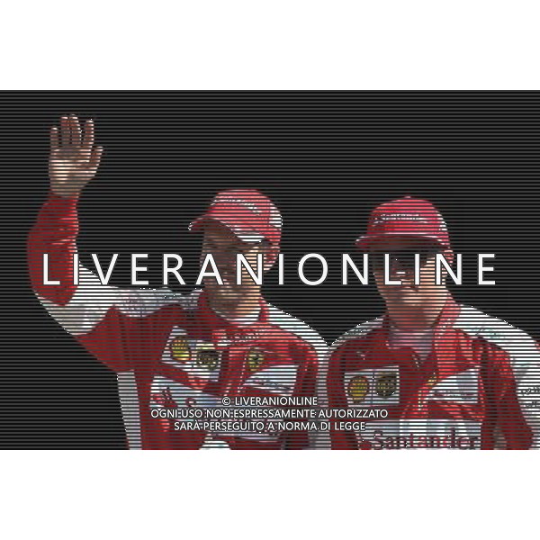 Sebastian Vettel (GER), Scuderia Ferrari and Kimi Raikkonen (FIN), Scuderia Ferrari 05.09.2015. Formula 1 World Championship, Rd 12, Italian Grand Prix, Monza, Italy, Qualifying Day. AG ALDO LIVERANI SAS ONLY ITALY