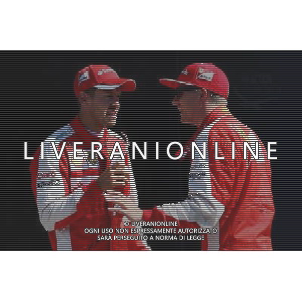 (L to R): third placed Sebastian Vettel (GER) Ferrari in parc ferme with second placed team mate Kimi Raikkonen (FIN) Ferrari. 05.09.2015. Formula 1 World Championship, Rd 12, Italian Grand Prix, Monza, Italy, Qualifying Day. AG ALDO LIVERANI SAS ONLY ITALY
