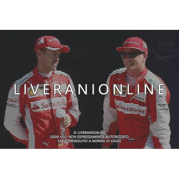 (L to R): third placed Sebastian Vettel (GER) Ferrari in parc ferme with second placed team mate Kimi Raikkonen (FIN) Ferrari. 05.09.2015. Formula 1 World Championship, Rd 12, Italian Grand Prix, Monza, Italy, Qualifying Day. AG ALDO LIVERANI SAS ONLY ITALY