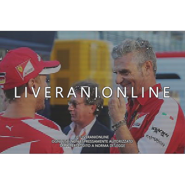 (L to R): Sebastian Vettel (GER) Ferrari with Maurizio Arrivabene (ITA) Ferrari Team Principal. 05.09.2015. Formula 1 World Championship, Rd 12, Italian Grand Prix, Monza, Italy, Qualifying Day. AG ALDO LIVERANI SAS ONLY ITALY