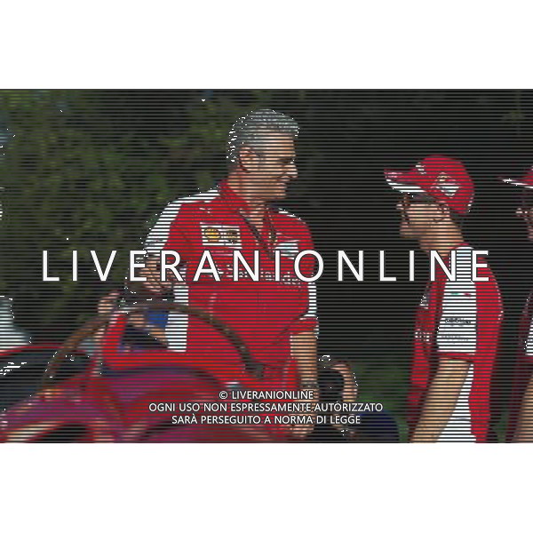 (L to R): Maurizio Arrivabene (ITA) Ferrari Team Principal; Sebastian Vettel (GER) Ferrari and team mate Kimi Raikkonen (FIN) Ferrari on the Monza banking at a Shell photoshoot. 05.09.2015. Formula 1 World Championship, Rd 12, Italian Grand Prix, Monza, Italy, Qualifying Day. AG ALDO LIVERANI SAS ONLY ITALY