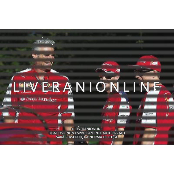 (L to R): Maurizio Arrivabene (ITA) Ferrari Team Principal; Sebastian Vettel (GER) Ferrari and team mate Kimi Raikkonen (FIN) Ferrari on the Monza banking at a Shell photoshoot. 05.09.2015. Formula 1 World Championship, Rd 12, Italian Grand Prix, Monza, Italy, Qualifying Day. AG ALDO LIVERANI SAS ONLY ITALY