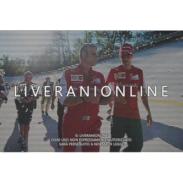 (L to R): Maurizio Arrivabene (ITA) Ferrari Team Principal and Sebastian Vettel (GER) Ferrari on the Monza banking at a Shell photoshoot. 05.09.2015. Formula 1 World Championship, Rd 12, Italian Grand Prix, Monza, Italy, Qualifying Day. AG ALDO LIVERANI SAS ONLY ITALY