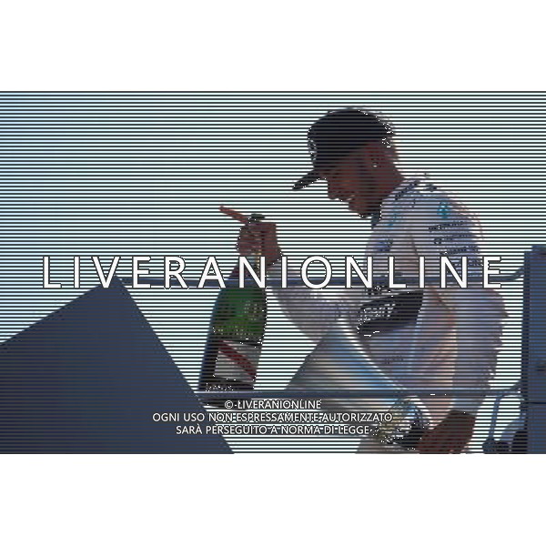 Race winner Lewis Hamilton (GBR) Mercedes AMG F1 celebrates on the podium. 06.09.2015. Formula 1 World Championship, Rd 12, Italian Grand Prix, Monza, Italy, Race Day. AG ALDO LIVERANI SAS ONLY ITALY