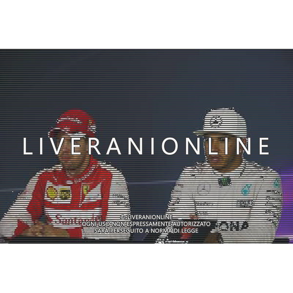 (L to R): Sebastian Vettel (GER) Ferrari with race winner Lewis Hamilton (GBR) Mercedes AMG F1 in the FIA Press Conference. 06.09.2015. Formula 1 World Championship, Rd 12, Italian Grand Prix, Monza, Italy, Race Day. AG ALDO LIVERANI SAS ONLY ITALY