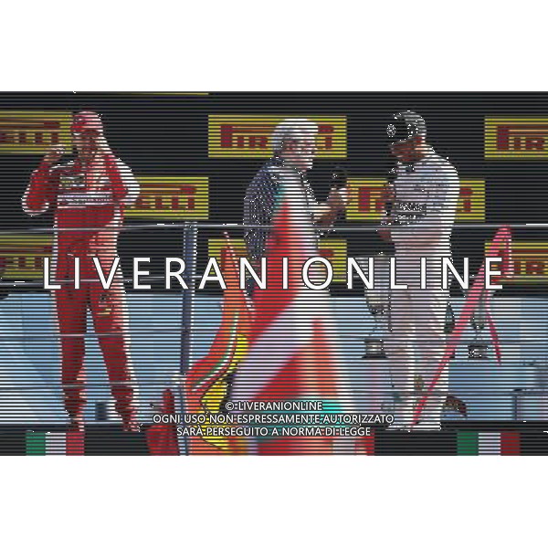 The podium (L to R): Sebastian Vettel (GER) Ferrari, second; George Lucas (USA) Star Wars Creator; Lewis Hamilton (GBR) Mercedes AMG F1, race winner. 06.09.2015. Formula 1 World Championship, Rd 12, Italian Grand Prix, Monza, Italy, Race Day. AG ALDO LIVERANI SAS ONLY ITALY