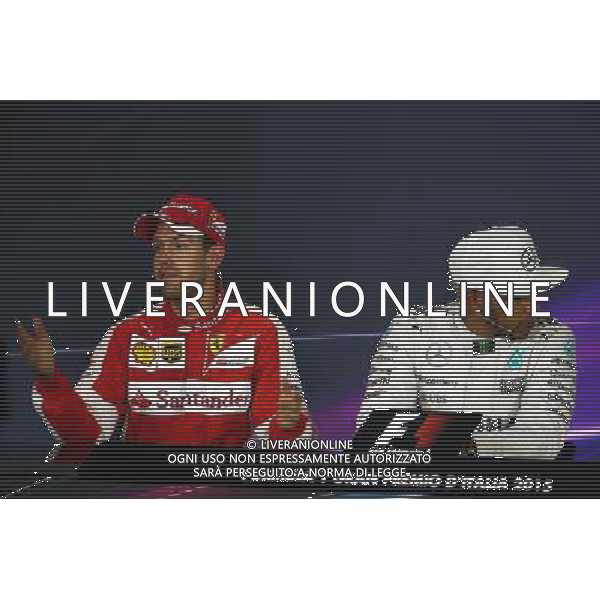 (L to R): Sebastian Vettel (GER) Ferrari and Lewis Hamilton (GBR) Mercedes AMG F1 in the FIA Press Conference. 06.09.2015. Formula 1 World Championship, Rd 12, Italian Grand Prix, Monza, Italy, Race Day. AG ALDO LIVERANI SAS ONLY ITALY