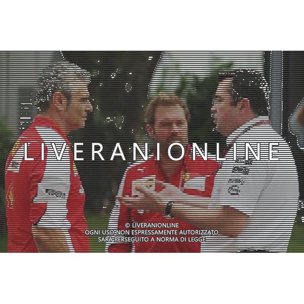 (L to R): Maurizio Arrivabene (ITA) Ferrari Team Principal with Gino Rosato (CDN) Ferrari and Eric Boullier (FRA) McLaren Racing Director. 17.09.2015. Formula 1 World Championship, Rd 13, Singapore Grand Prix, Singapore, Singapore, Preparation Day. AG ALDO LIVERANI SAS ONLY ITALY