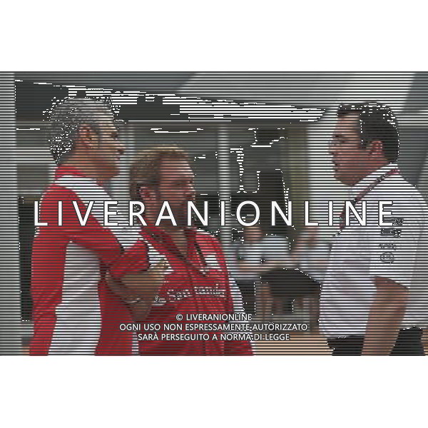 (L to R): Maurizio Arrivabene (ITA) Ferrari Team Principal with Gino Rosato (CDN) Ferrari and Eric Boullier (FRA) McLaren Racing Director. 17.09.2015. Formula 1 World Championship, Rd 13, Singapore Grand Prix, Singapore, Singapore, Preparation Day. AG ALDO LIVERANI SAS ONLY ITALY