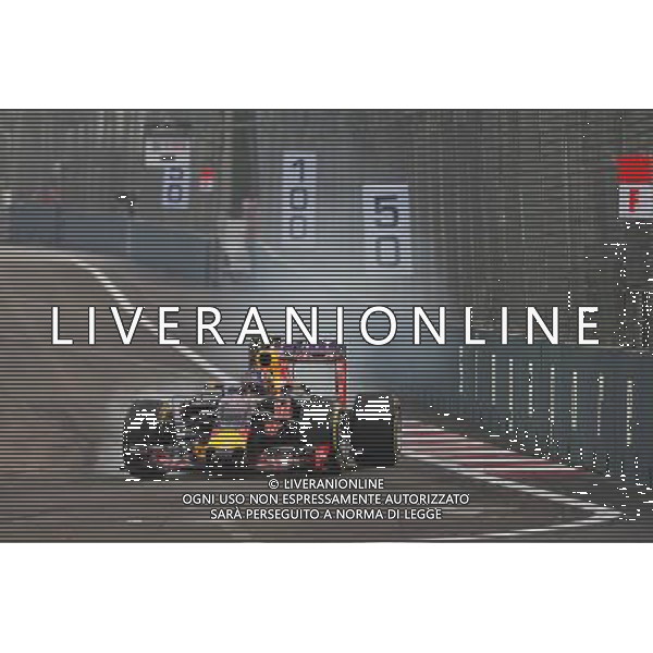Daniil Kvyat (RUS) Red Bull Racing RB11 locks up under braking. 19.09.2015. Formula 1 World Championship, Rd 13, Singapore Grand Prix, Singapore, Singapore, Qualifying Day. - www.xpbimages.com, EMail: requests@xpbimages.com - copy of publication required for printed pictures. Every used picture is fee-liable. Â© Copyright: Photo4 / XPB Images/Agenzia Aldo Liverani s.a.s.