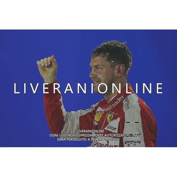 Sebastian Vettel (GER) Ferrari celebrates his pole position in parc ferme. 19.09.2015. Formula 1 World Championship, Rd 13, Singapore Grand Prix, Singapore, Singapore, Qualifying Day. - www.xpbimages.com, EMail: requests@xpbimages.com - copy of publication required for printed pictures. Every used picture is fee-liable. Â© Copyright: Charniaux / XPB Images/Agenzia Aldo Liverani s.a.s.