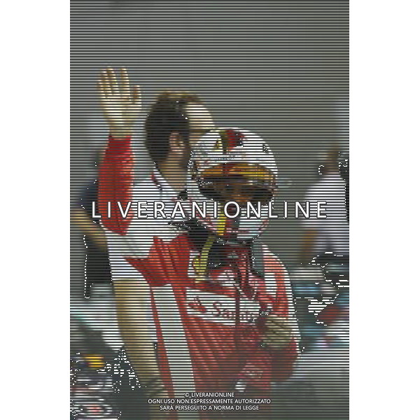 Sebastian Vettel (GER) Ferrari celebrates his pole position in parc ferme. 19.09.2015. Formula 1 World Championship, Rd 13, Singapore Grand Prix, Singapore, Singapore, Qualifying Day. - www.xpbimages.com, EMail: requests@xpbimages.com - copy of publication required for printed pictures. Every used picture is fee-liable. Â© Copyright: Batchelor / XPB Images/Agenzia Aldo Liverani s.a.s.