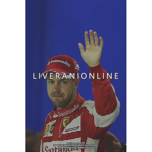 Sebastian Vettel (GER) Ferrari celebrates his pole position in parc ferme. 19.09.2015. Formula 1 World Championship, Rd 13, Singapore Grand Prix, Singapore, Singapore, Qualifying Day. - www.xpbimages.com, EMail: requests@xpbimages.com - copy of publication required for printed pictures. Every used picture is fee-liable. Â© Copyright: Charniaux / XPB Images/Agenzia Aldo Liverani s.a.s.