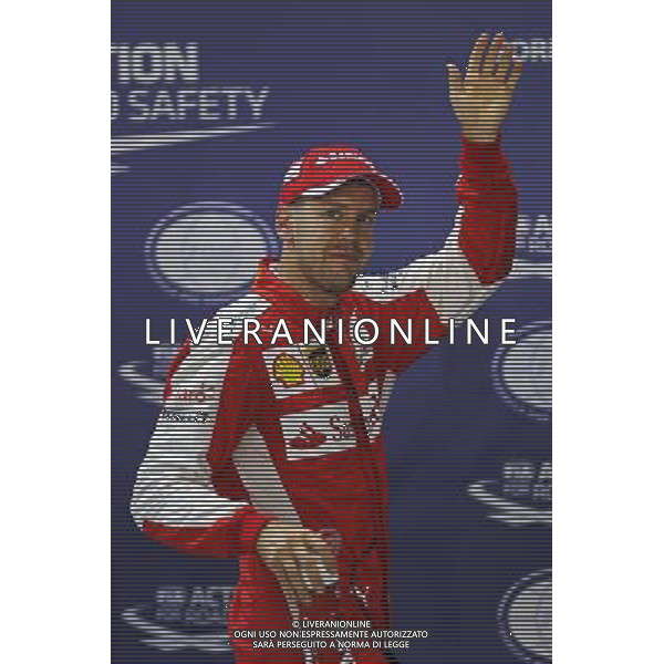 Sebastian Vettel (GER) Ferrari celebrates his pole position in parc ferme. 19.09.2015. Formula 1 World Championship, Rd 13, Singapore Grand Prix, Singapore, Singapore, Qualifying Day. - www.xpbimages.com, EMail: requests@xpbimages.com - copy of publication required for printed pictures. Every used picture is fee-liable. Â© Copyright: Batchelor / XPB Images/Agenzia Aldo Liverani s.a.s.