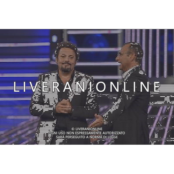 Roma - 18/09/2015 - Studi Rai Studios - Trasmissione TV \' Tale e Quale Show \' - nella foto: Carlo Conti e Enrico Brignano / Ph. Fabrizio Corradetti - Ag. Aldo Liverani sas