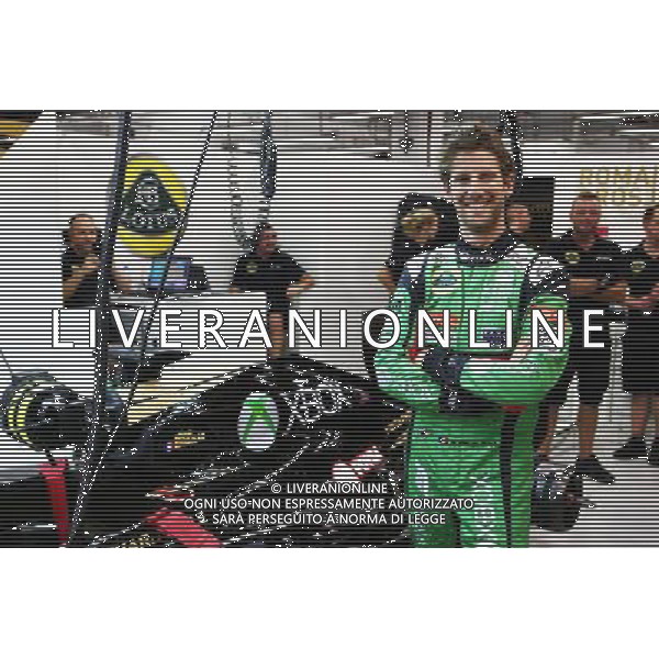 Romain Grosjean (FRA) Lotus F1 Team in Xbox overalls. 19.09.2015. Formula 1 World Championship, Rd 13, Singapore Grand Prix, Singapore, Singapore, Qualifying Day. AG ALDO LIVERANI SAS ONLY ITALY