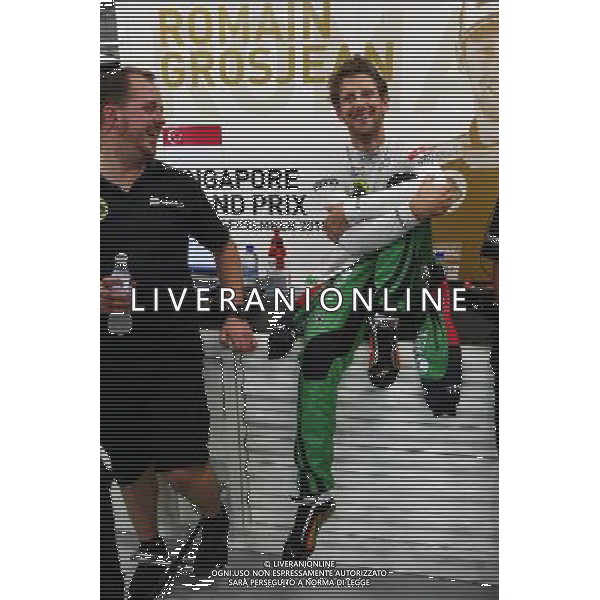 Romain Grosjean (FRA) Lotus F1 Team in Xbox overalls. 19.09.2015. Formula 1 World Championship, Rd 13, Singapore Grand Prix, Singapore, Singapore, Qualifying Day. AG ALDO LIVERANI SAS ONLY ITALY