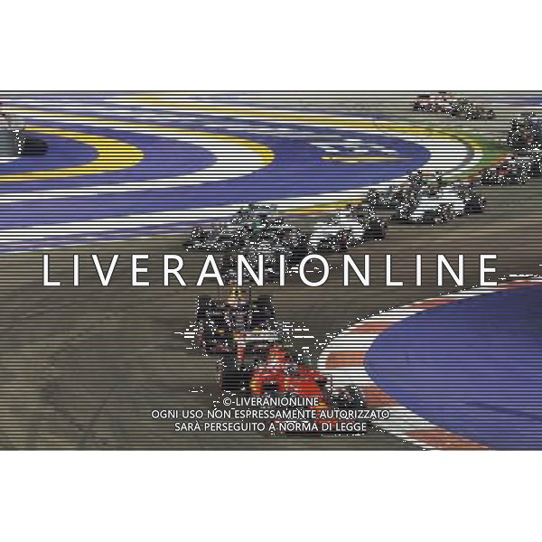 Kimi Raikkonen (FIN) Ferrari SF15-T at the start of the race. 20.09.2015. Formula 1 World Championship, Rd 13, Singapore Grand Prix, Singapore, Singapore, Race Day. AG ALDO LIVERANI SAS ONLY ITALY