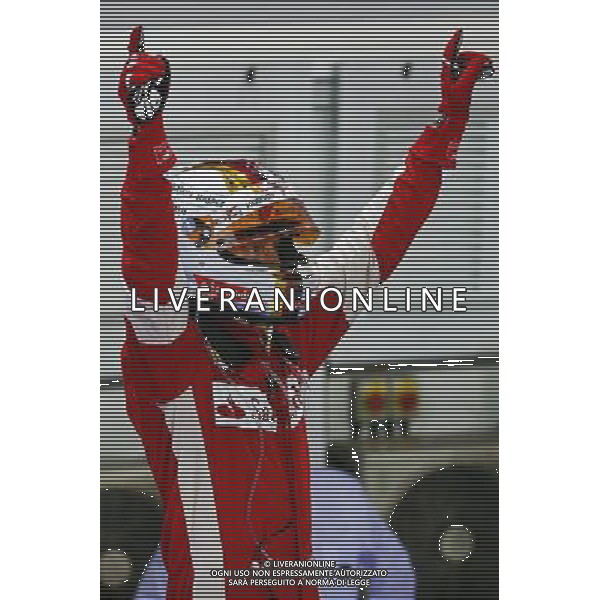 Race winner Sebastian Vettel (GER) Ferrari celebrates in parc ferme. 20.09.2015. Formula 1 World Championship, Rd 13, Singapore Grand Prix, Singapore, Singapore, Race Day. AG ALDO LIVERANI SAS ONLY ITALY
