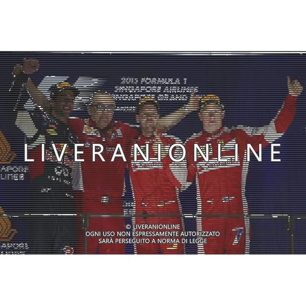 1st place Sebastian Vettel (GER) Ferrari SF15-T, 2nd place Daniel Ricciardo (AUS) Red Bull Racing RB11 and 3rd place Kimi Raikkonen (FIN) Ferrari SF15-T. 20.09.2015. Formula 1 World Championship, Rd 13, Singapore Grand Prix, Singapore, Singapore, Race Day. AG ALDO LIVERANI SAS ONLY ITALY