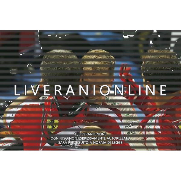 Race winner Sebastian Vettel (GER) Ferrari celebrates in parc ferme. 20.09.2015. Formula 1 World Championship, Rd 13, Singapore Grand Prix, Singapore, Singapore, Race Day. AG ALDO LIVERANI SAS ONLY ITALY