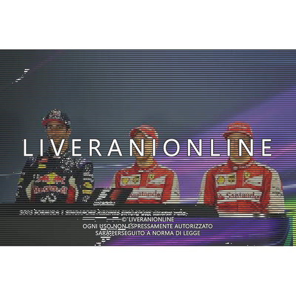 The post race FIA Press Conference (L to R): Daniel Ricciardo (AUS) Red Bull Racing, second; Sebastian Vettel (GER) Ferrari, race winner; Kimi Raikkonen (FIN) Ferrari, third. 20.09.2015. Formula 1 World Championship, Rd 13, Singapore Grand Prix, Singapore, Singapore, Race Day. AG ALDO LIVERANI SAS ONLY ITALY